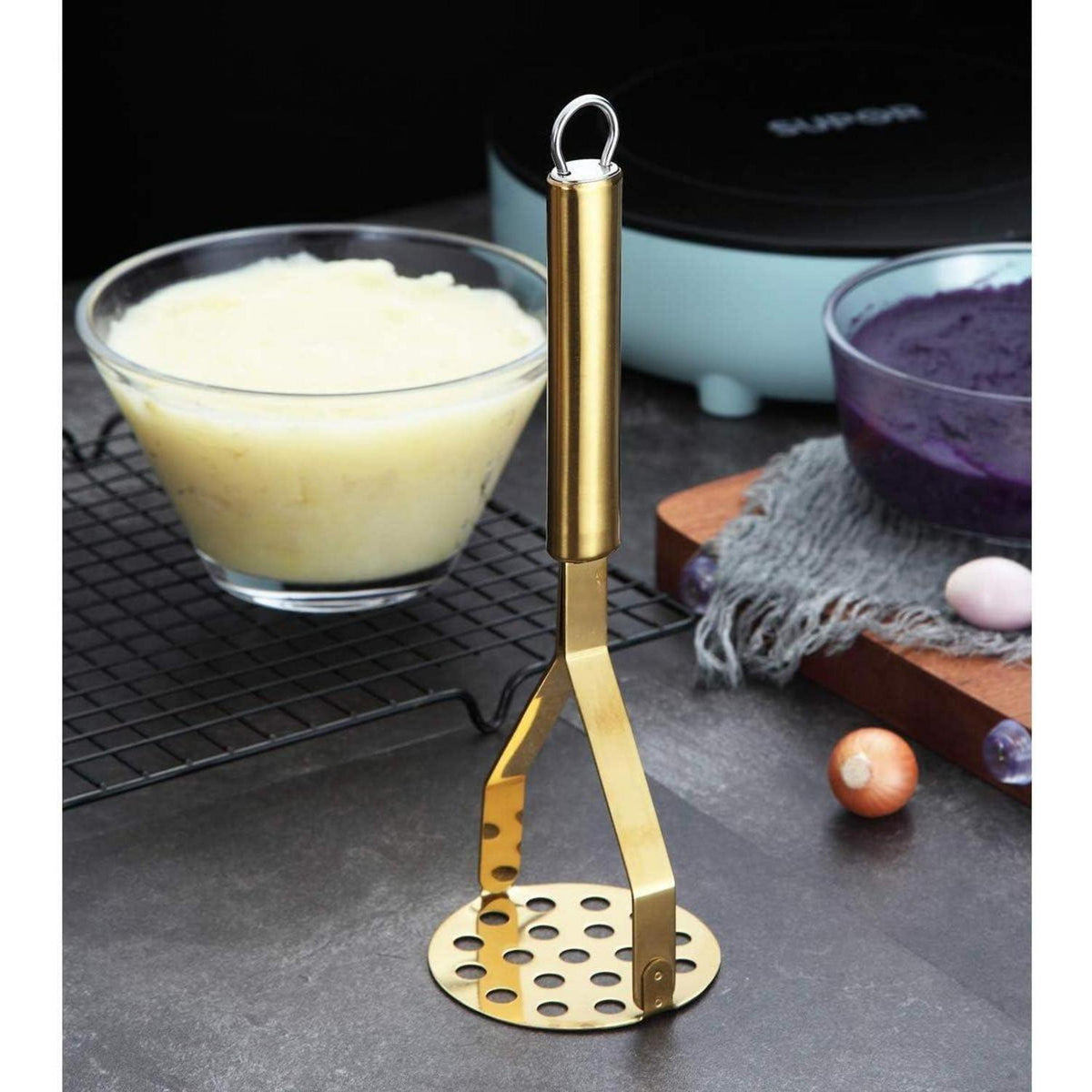 Kartoffelstampfer Edelstahl goldbeschichtet, ergonomisch