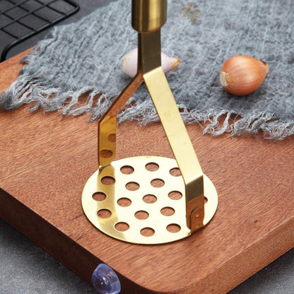 Kartoffelstampfer Edelstahl goldbeschichtet, ergonomisch