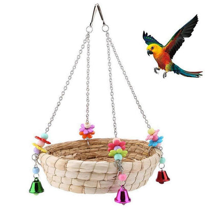 Handgewebtes Vogelnest aus Stroh mit Glocken