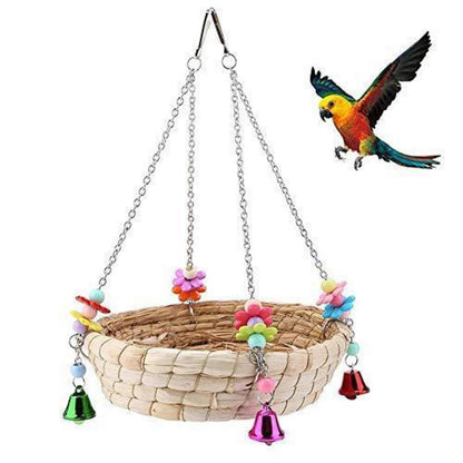 Handgewebtes Vogelnest aus Stroh mit Glocken