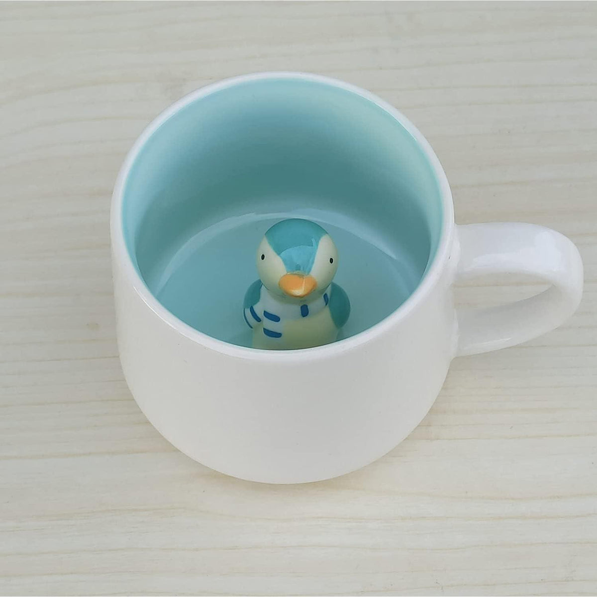 3D Pinguin Kaffeetasse mit Überraschung im Boden
