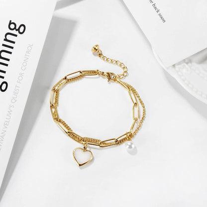 OSTAN Damen Armband mit Herz Anhänger aus Edelstahl