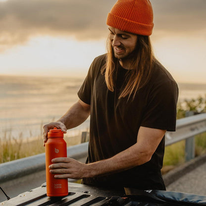 Isolierte Sport-Trinkflasche Edelstahl mit Strohhalm 1,2 l Orangefarben