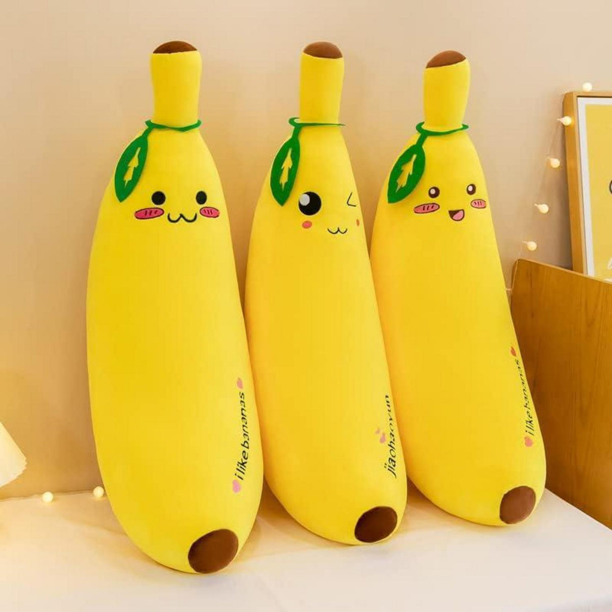 Banane Plüschtier Kuschelkissen 35cm Zwinkern