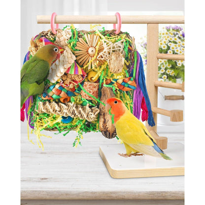 Vogelspielzeug aus Naturholz mit Seegras, gelb-grün