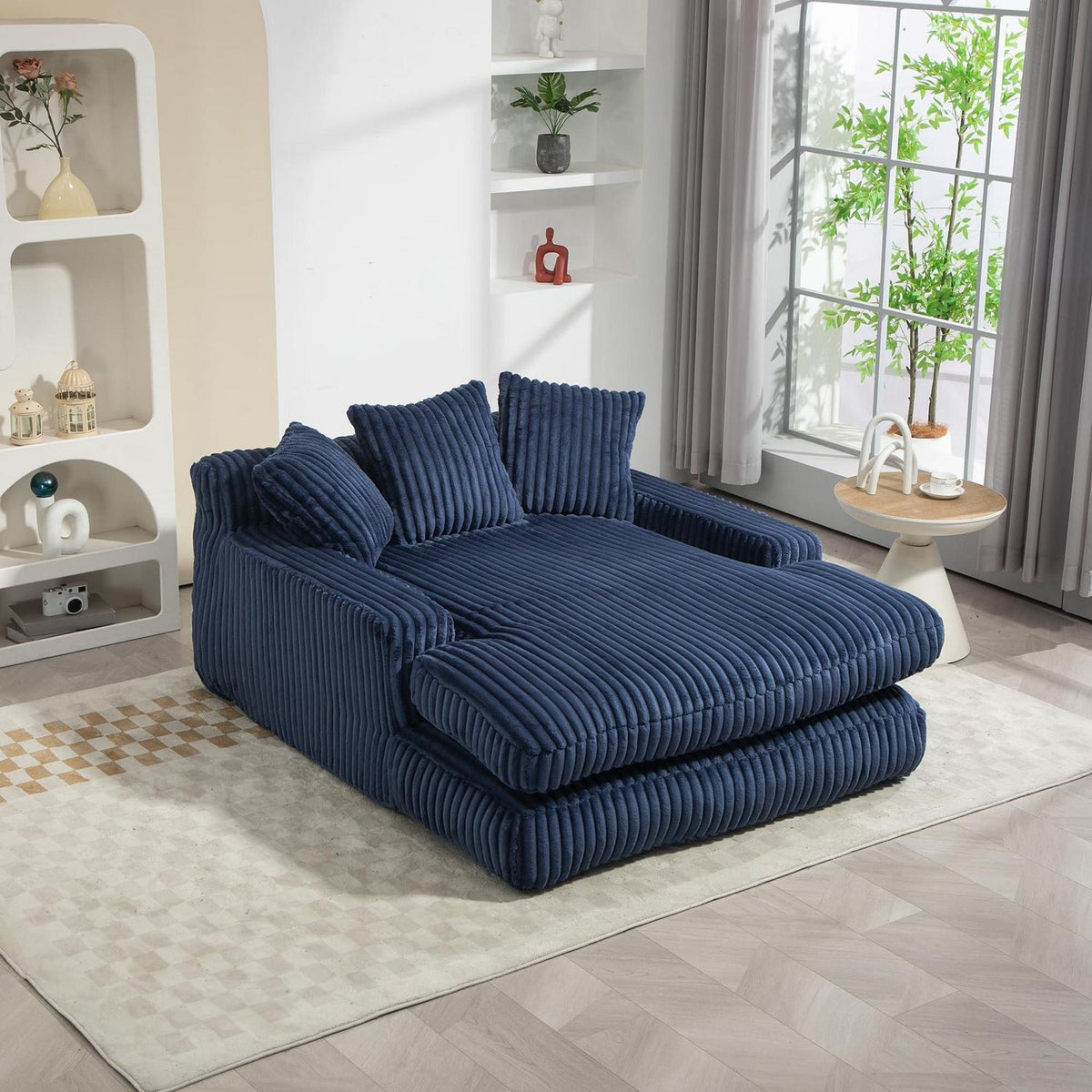 Cloud Sofa: Marineblaues Cord Schlafsofa mit 3 Kissen
